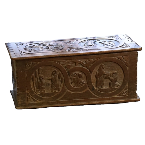 1524 - An early oak coffer carved with Biblical scenes of Moses, Abraham, Ruth etc 35cm H X 80cm L X 40cm D