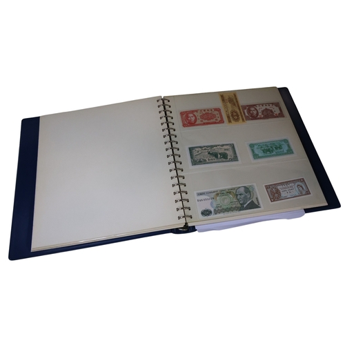 A folder of worldwide bank notes including Scotland, Indonesia ...