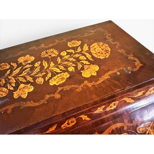 575 - A Dutch mahogany and marquetry inlaid bombe cylinder bureau, decorated throughout with intricate flo... 