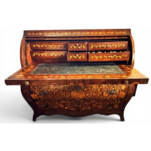 575 - A Dutch mahogany and marquetry inlaid bombe cylinder bureau, decorated throughout with intricate flo... 