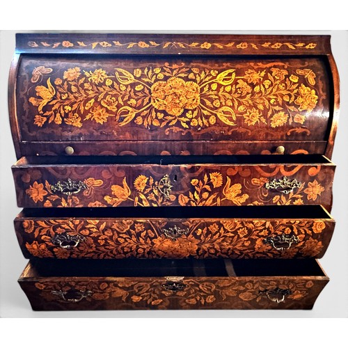 575 - A Dutch mahogany and marquetry inlaid bombe cylinder bureau, decorated throughout with intricate flo... 
