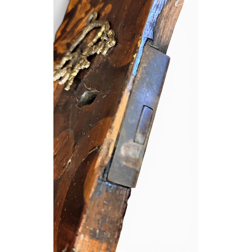 575 - A Dutch mahogany and marquetry inlaid bombe cylinder bureau, decorated throughout with intricate flo... 