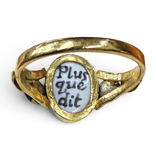 33 - A gem-set gold and enamel masquerade ring, the central mask with inset old cut diamond eyes flanked ... 