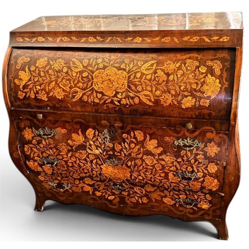 575 - A Dutch mahogany and marquetry inlaid bombe cylinder bureau, decorated throughout with intricate flo... 