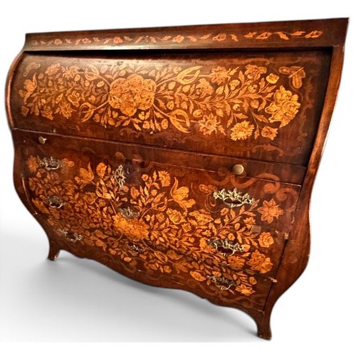 575 - A Dutch mahogany and marquetry inlaid bombe cylinder bureau, decorated throughout with intricate flo... 