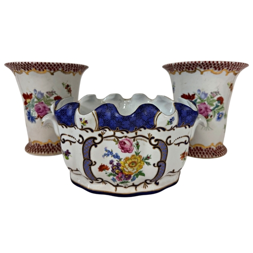 10 - A collection of contemporary ceramics including a pair of trumpet shaped vases with floral detail, f... 