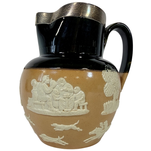 16 - A pair of Doulton Lamberth jugs with loop handles and applied hunting and merry-making scenes, each ... 