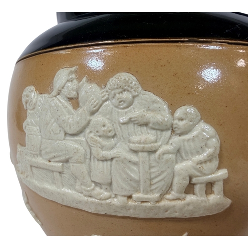 16 - A pair of Doulton Lamberth jugs with loop handles and applied hunting and merry-making scenes, each ... 