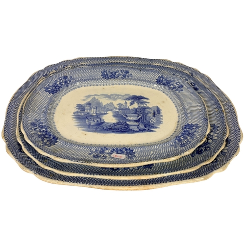 17 - A graduated set of three 19th century blue and white transfer ware meat platters with a Grecian land... 