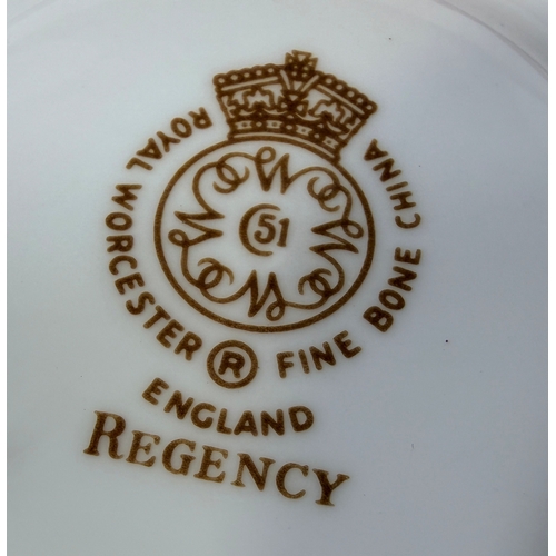 24 - A large collection of Royal Worcester dinner and tea ware with a Regency pattern, comprising of grad... 