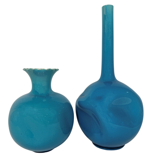 47 - Two Burmantofts vases in a turquoise glaze, each with dimpled bodies, one with a drawn neck, the oth... 