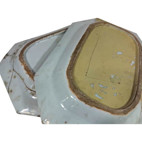 49 - Two 18th century Cantonese export armorial dishes of canted rectangular form (AF). 28cm maximum widt... 