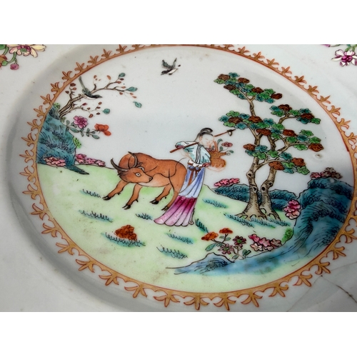 51 - A blue and white Kraak dish with painted detail, a Cantonese familial rose plates, a blue and white ... 