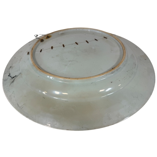 52 - A 19th century blue and white Chinese porcelain charger 40cm diameter with landscaped detail and sta... 