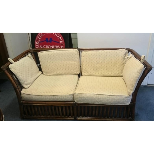 560 - Double Conservatory Settee with loose cushions, c.57in wide, 26in tall