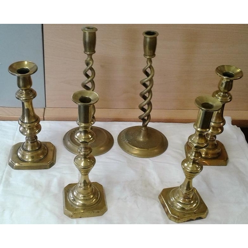 67 - Three Pairs of Brass Candlesticks