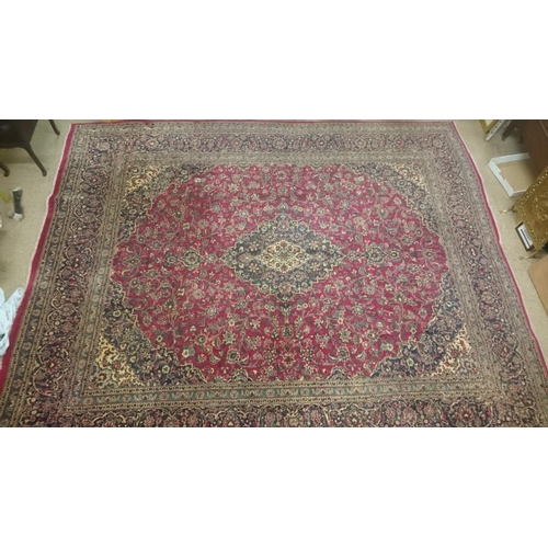 430 - Large Red Ground Kashan Carpet with traditional all-over medallion design, c.10ft x 12ft