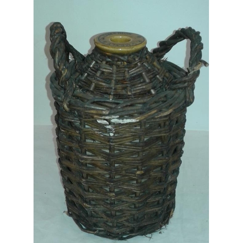 286 - One Gallon Stoneware Jug in Wicker Holder  - P. O'Mealy & Co., Limerick, c.11in