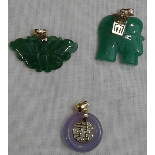 594 - Collection of Three Jade and Gold Pendants