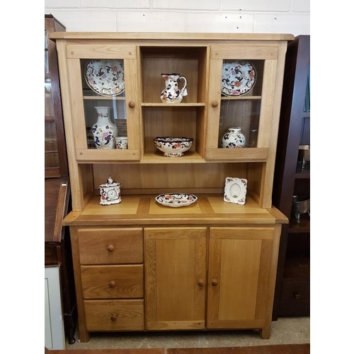 324 - Good Solid Oak Dresser, the top with 2 glazed doors and open shelves above a base with an arrangemen... 