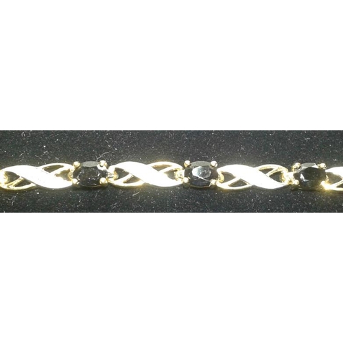 519 - Gold & Dark Sapphire Bracelet