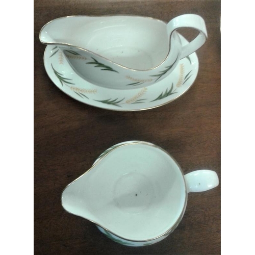 593 - Bone China Dinner Ware (signed by decorator)