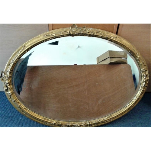 29 - Oval and Gilt Framed Mirror - 36 x 26ins