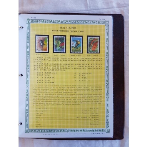 37 - Four Chinese Postage Stamp Albums