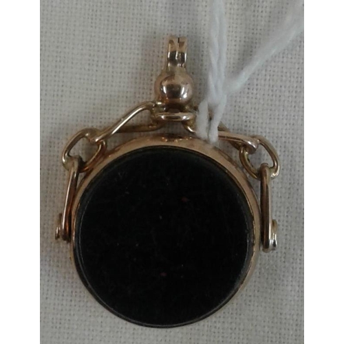 591 - 9ct Rose Gold Mother of Pearl and Black Onyx Fob