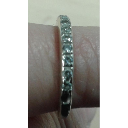 592 - 14K White Gold and Diamond Ring (small size)