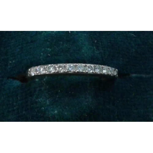 592 - 14K White Gold and Diamond Ring (small size)