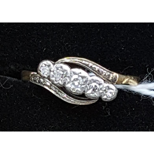 598 - 9ct Gold Five Stone Diamond Twist Ring - Illusion Setting