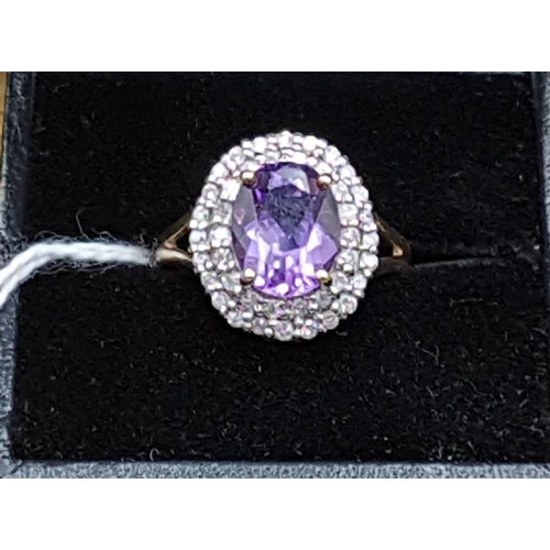 603 - 9ct Gold and Amethyst Dress Ring