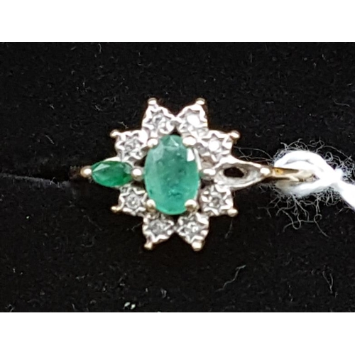 609 - 9ct Diamond and Emerald Ring