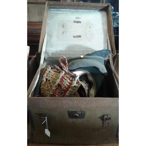 555 - Canvas and Leather Bound Gentleman's Travelling Case containing Hats, etc.