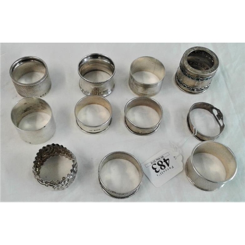 483 - Collection of Eleven Hallmarked Silver Napkin Rings (various dates and makers) c. 270 grams