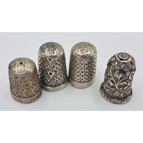 313 - Three Hallmarked Silver Thimbles (c.14.5grams) and one white metal