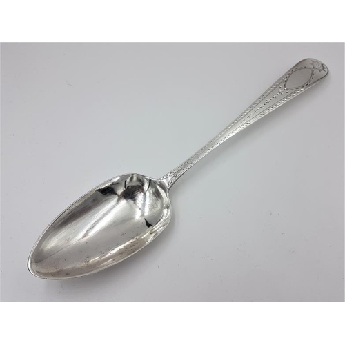 318 - Georgian Irish Bright Cut Silver Serving Spoon, Hallmarked Dublin c.1791 and maker's mark 