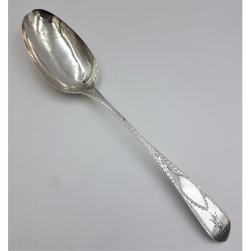 342 - Georgian Irish Bright Cut Silver Serving Spoon, Hallmarked Dublin c.1810 and maker's mark 