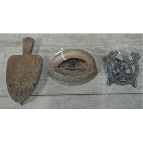 32 - Iron Trivet, Teapot Stand and one other implement