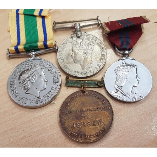 292 - Four British Medals - India 1939-45 Medal, Liberation of Jersey 1946, Iraq Medal and 1953 Queen Eliz... 