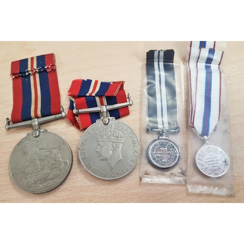 294 - Two 1939-45 War Medals, a miniature Distinguished Service Medal and a miniature 25 Year Reign of Eli... 