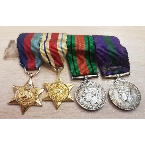 295 - Group of Four Miniature World War II Medals - The 1939-1945 Star, The Africa Star, The Defence Medal... 