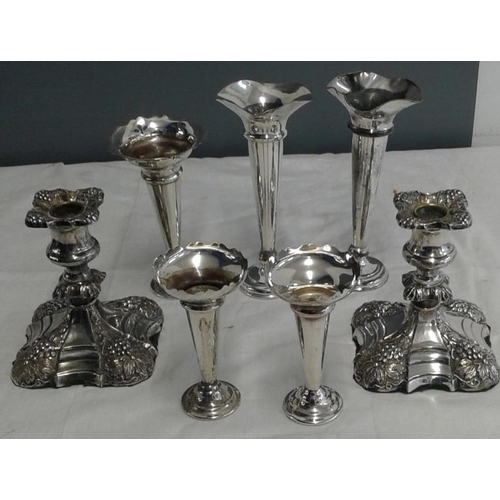 442 - Collection of Silver Plated Trumpet Vases and a Pair of Decorated Candlesticks