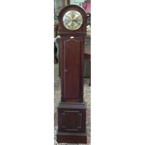 499 - Mahogany Case Granddaughter Clock with electric mechanism, c.56in tall