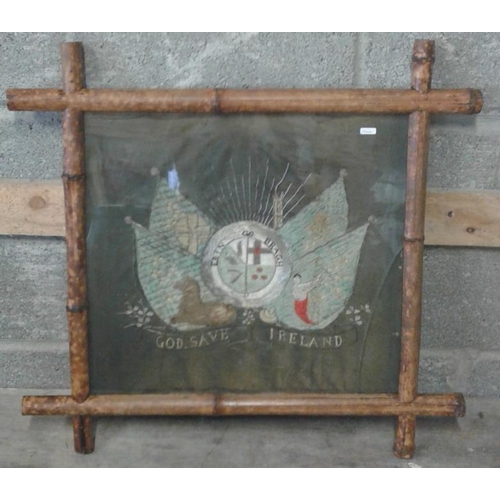 547 - 'Erin go Bragh - God Save Ireland' Hand Embroidered panel in a bamboo frame, c.28in x 28in