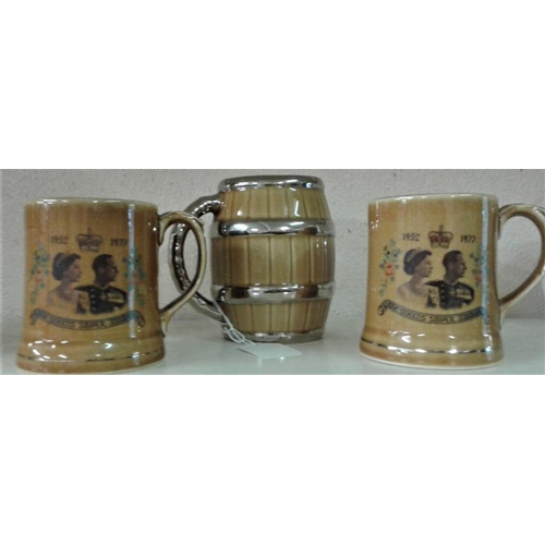 557 - Three Mugs (2 Queen's Silver Jubilee Mugs and a Wade Beer Mug)