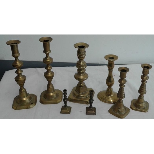 578 - Collection of Antique Brass Candlesticks (pairs and singles)