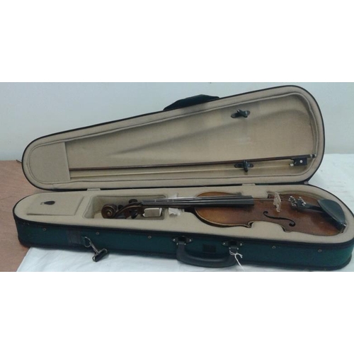 618 - Violin in Green Case, label inside reads 'Stradivarius Cremonensis'