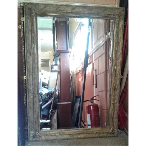 509 - Decorative and Gilt Framed Mirror with bevelled edge, c.32 x 44in